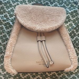 Kate Spade medium flap backpack leather shearling light sand value $449